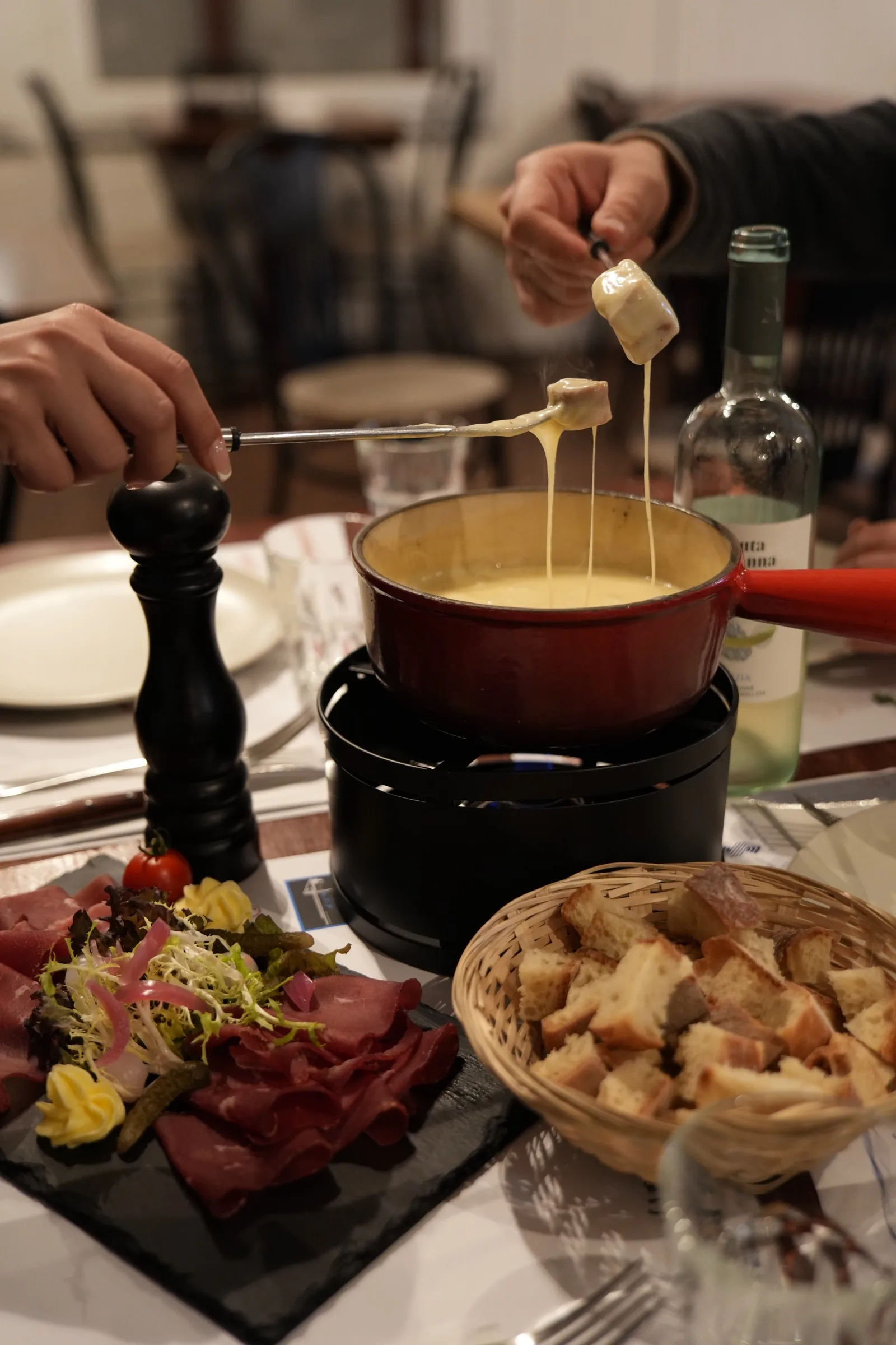 Le fromage fondu qui file au bout d’une fourchette à fondue