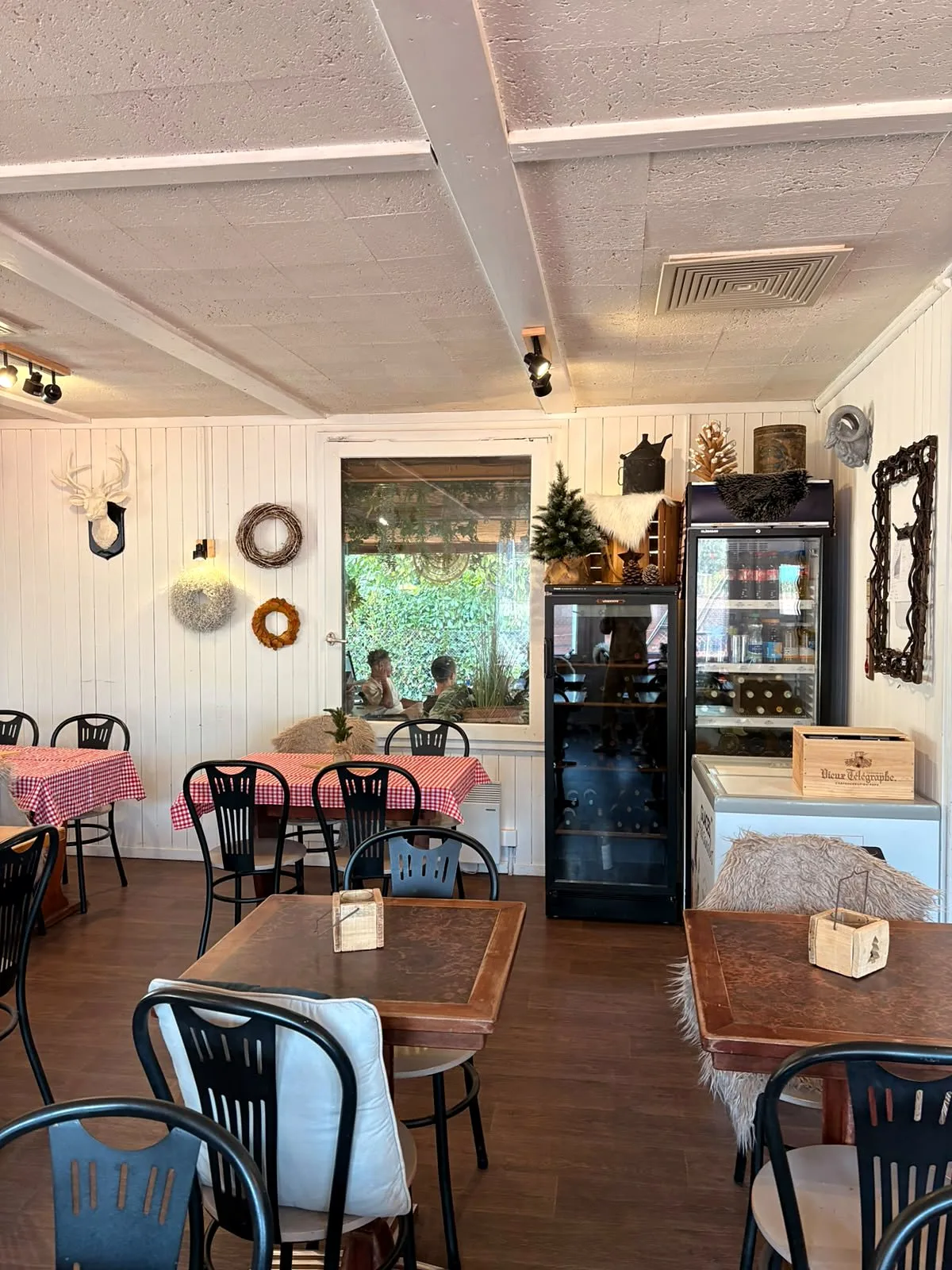 The dining room counter, with chalet decor and a small fir tree
